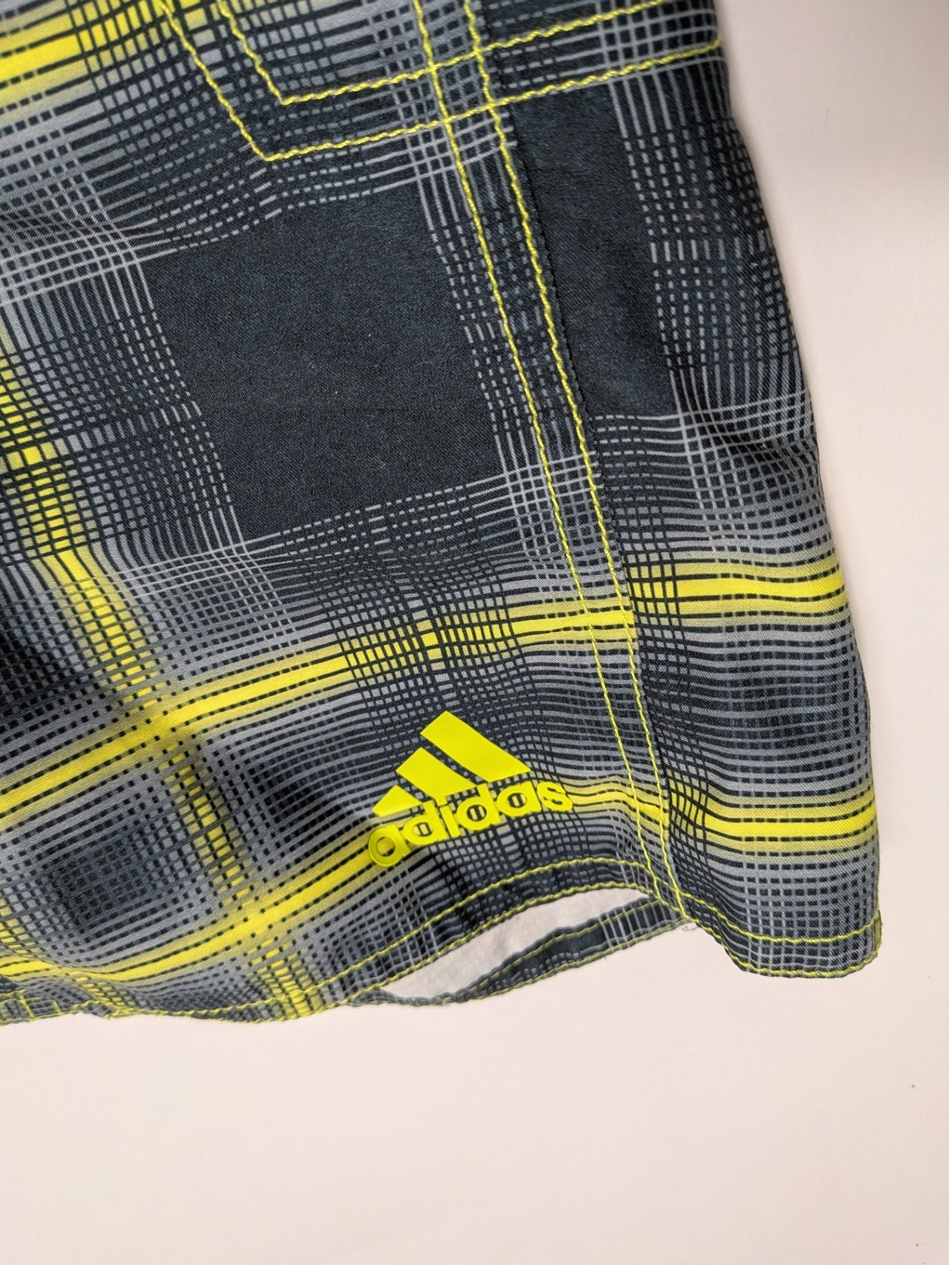 Adidas Shorts M Dark gray, yellow, and white plaid pattern