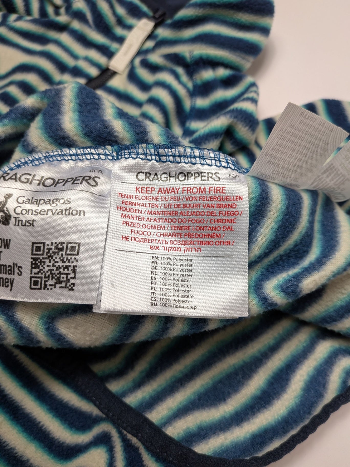 Craghoppers Fleece Jacket 128 Navy blue, white, and teal stripes