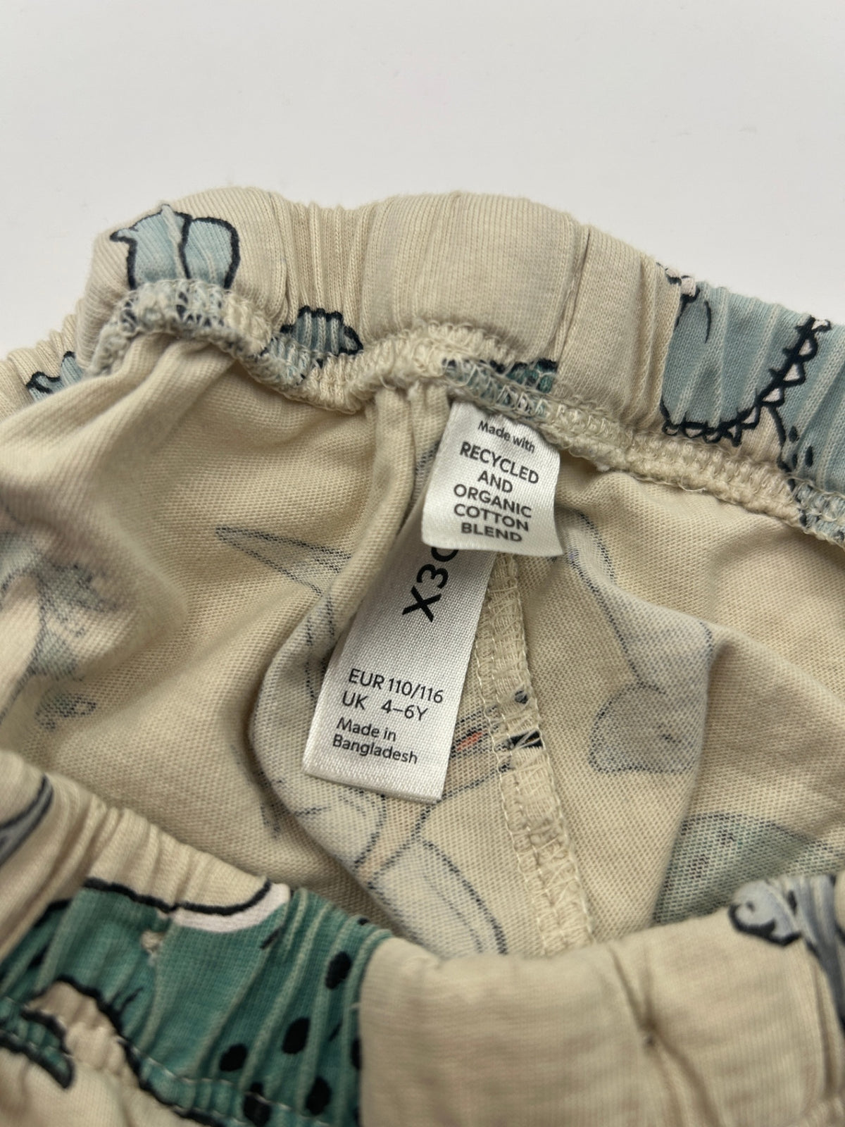 Lindex Pajamas 110 Beige with multicolor dinosaur print