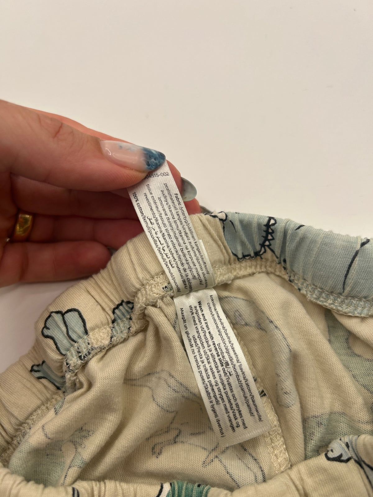 Lindex Pajamas 110 Beige with multicolor dinosaur print