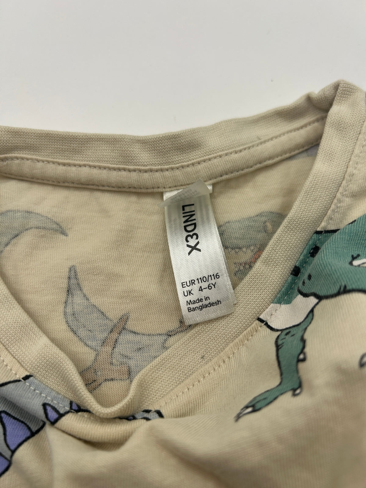 Lindex Pajamas 110 Beige with multicolor dinosaur print