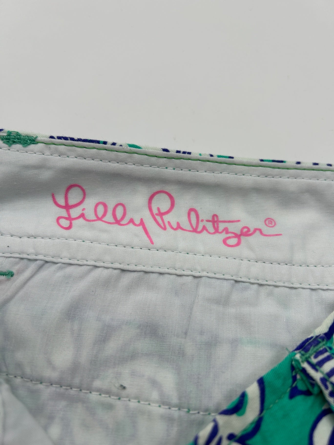 Unbranded or not visible Shorts Not visible Green and navy blue