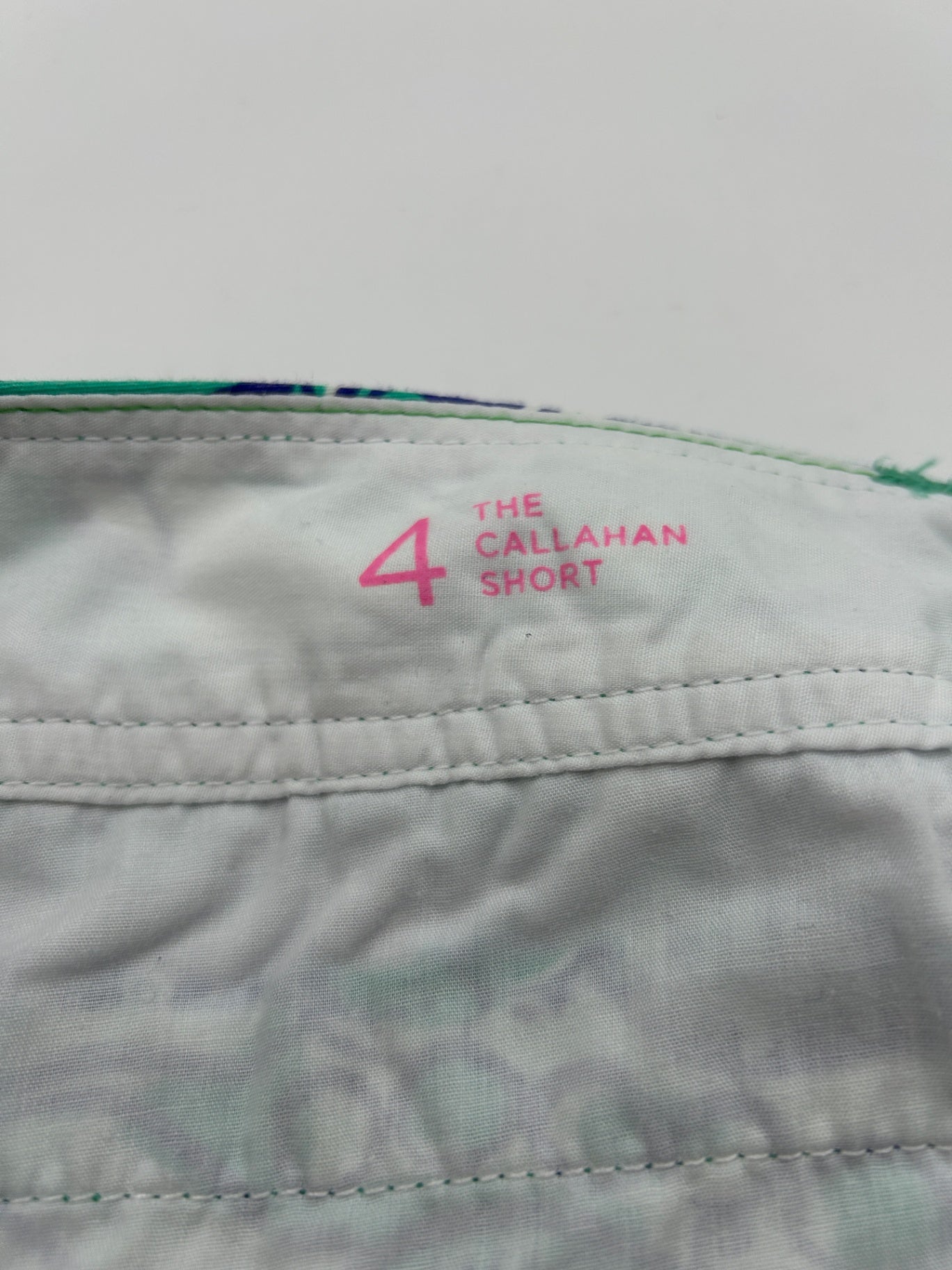 Unbranded or not visible Shorts Not visible Green and navy blue